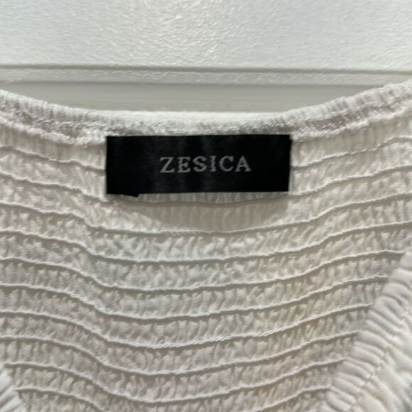 Puff Sleeve Summer Dress: perfect for a bridal shower or honeymoon 🤍 - Picture 3 of 4